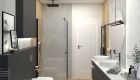 prysznic białe drzwi beton łazienka