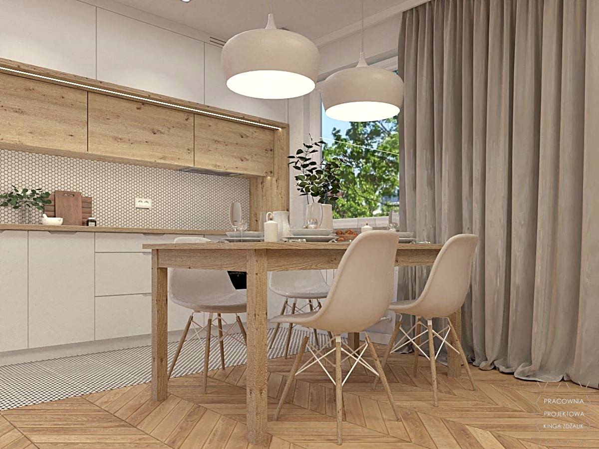 jasna kuchnia z jadalnią i krzesłami