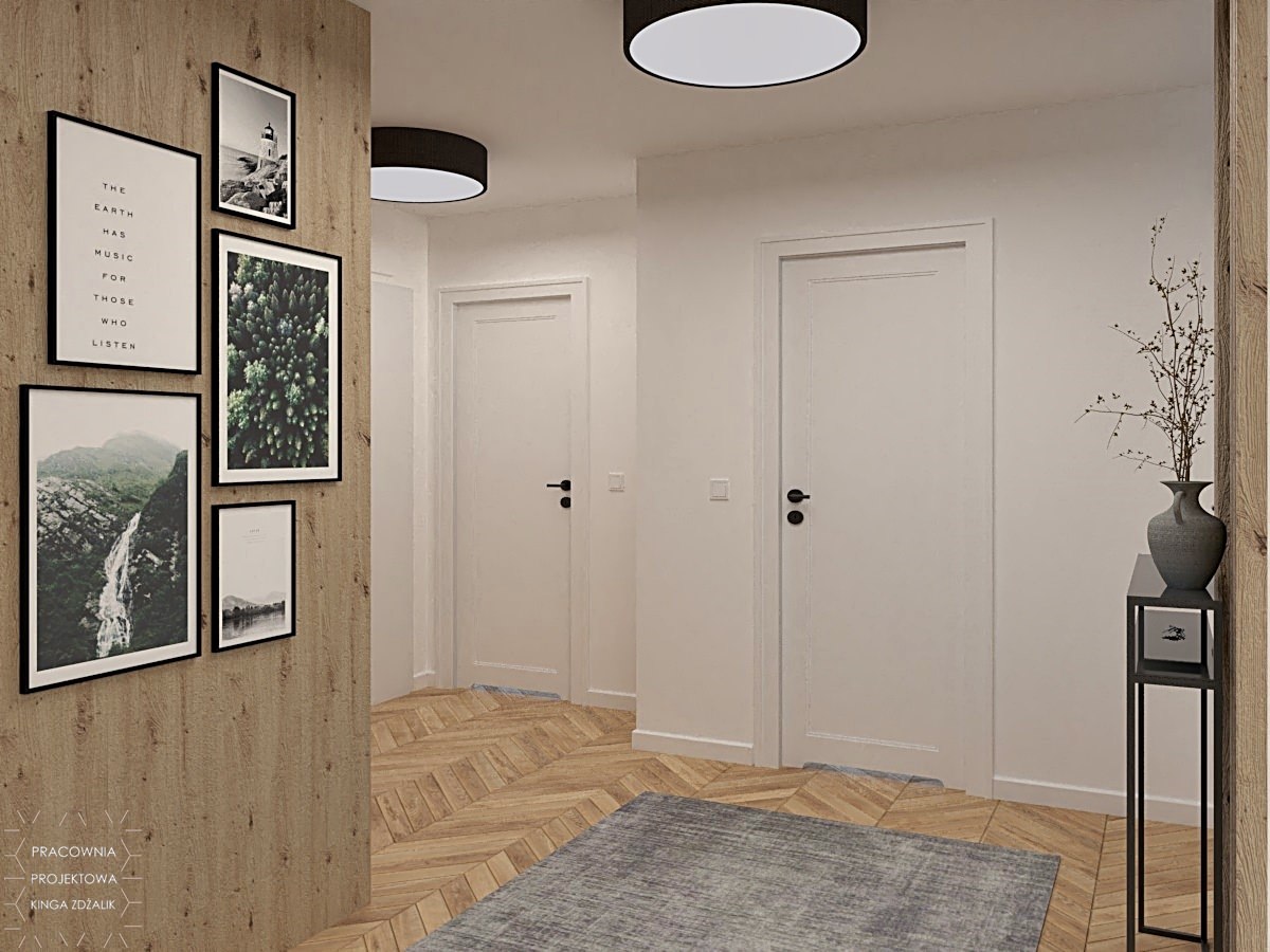 białe pełne drzwi w przedpokoju