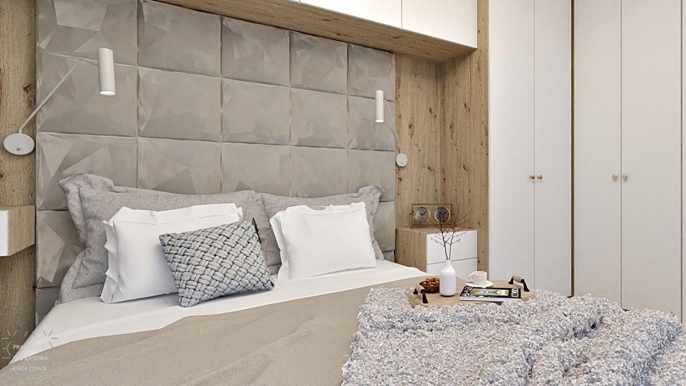 tapicerowane panele za łóżkiem w sypialni